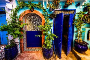 Colourful entrance door. Chefchaouen is a city in northwest Morocco. It is the chief town of the province of the same name, and is noted for its buildings in shades of blue.